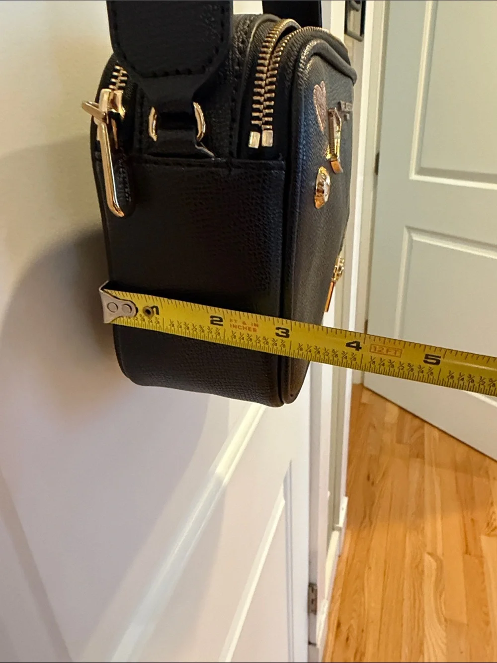 Karl Lagerfeld Black Crossbody Camera Bag with Gold & Pink Charm Accents